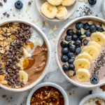 Three high protein yogurt bowl recipes featuring blueberry, chocolate peanut butter, and tropical flavors.